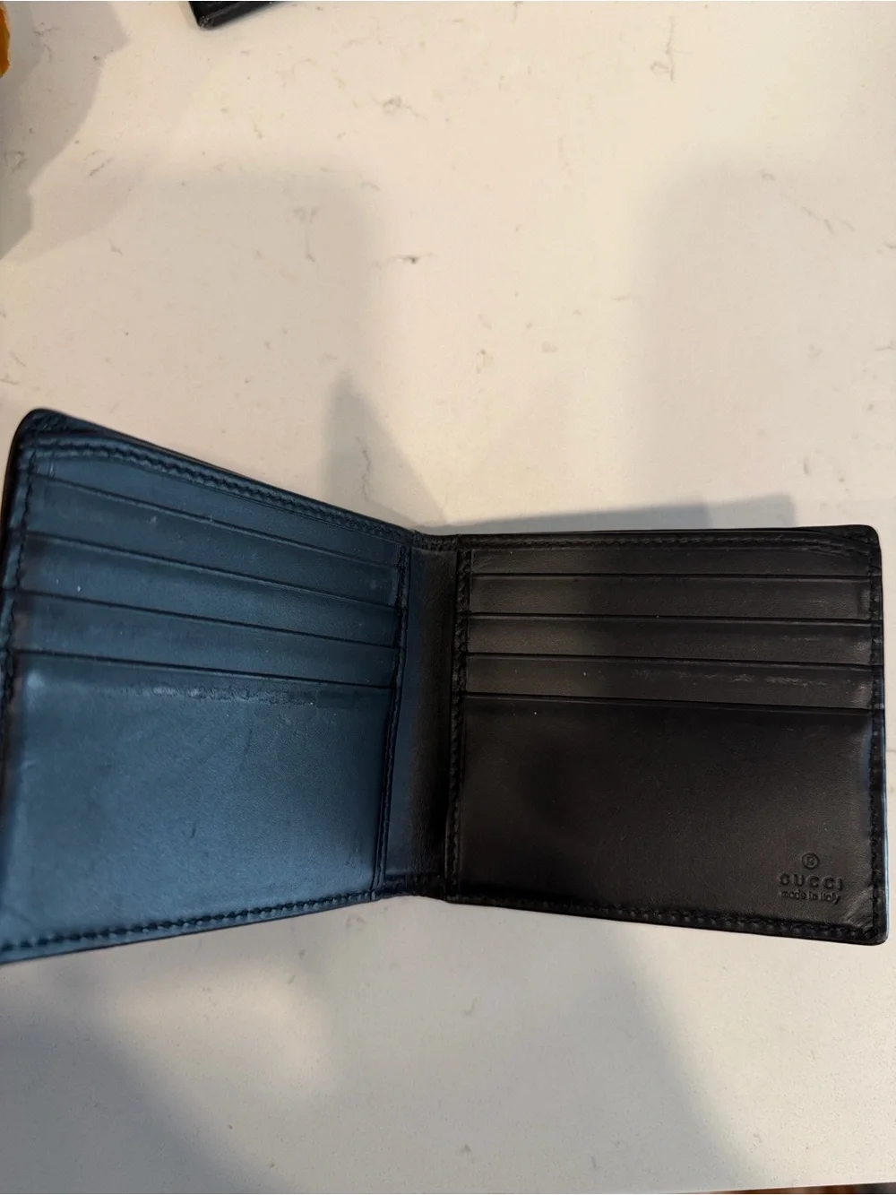 Gucci Black Embossed GG Leather Wallet with Silver-Tone Logo
